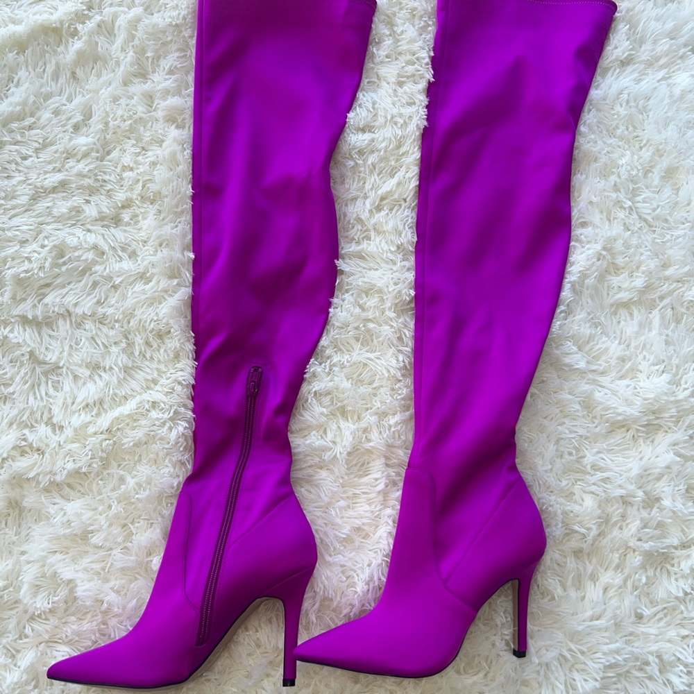 Also thigh high fuscia boots.